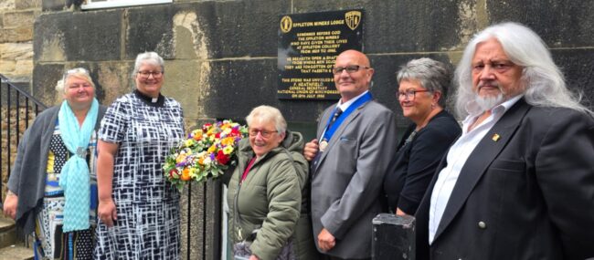Hetton Town Council Members and Reverend Dawn Butler under the Eppleton Miners Lodge Memorial plaque